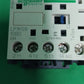 13015