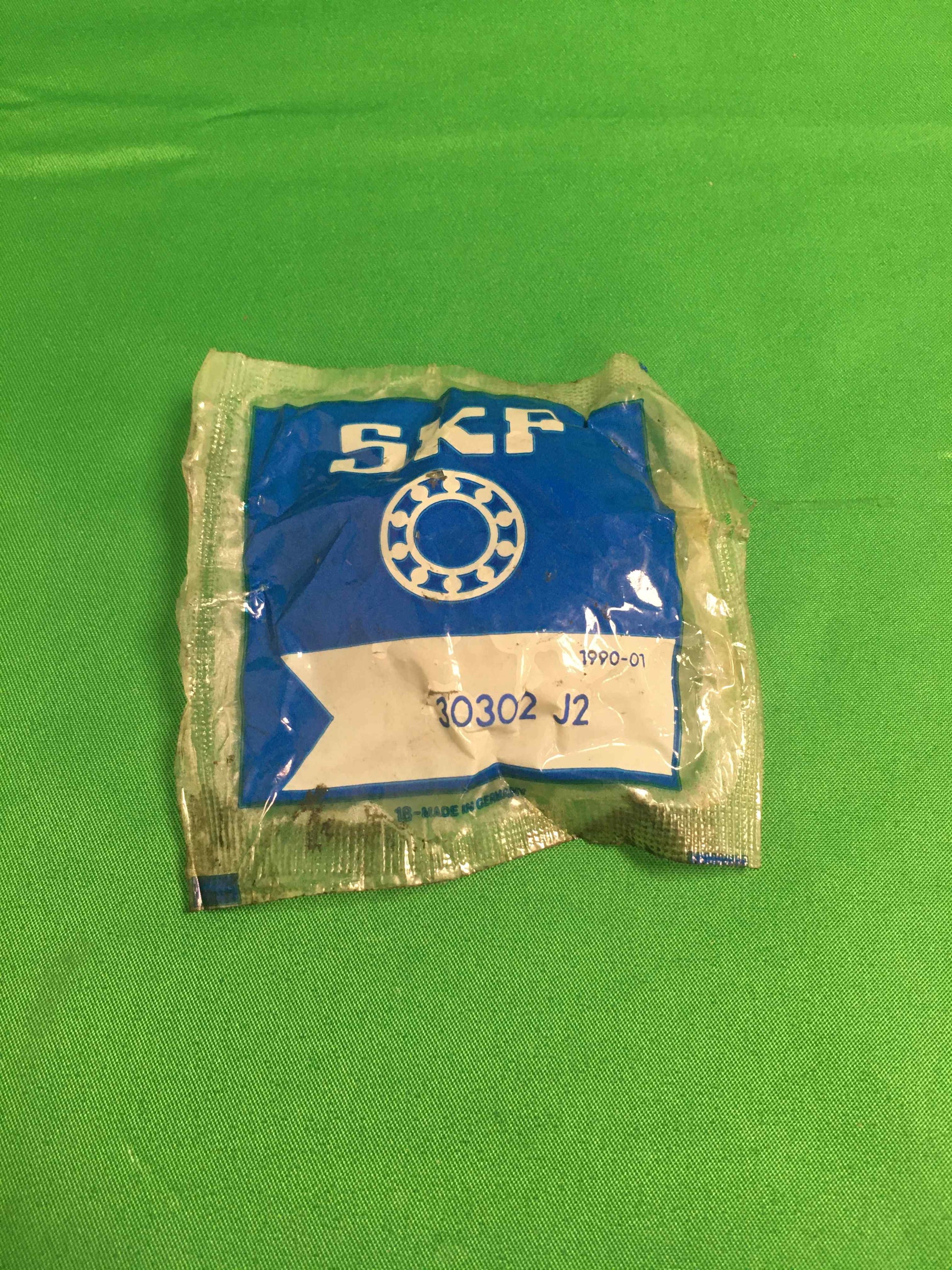 7693